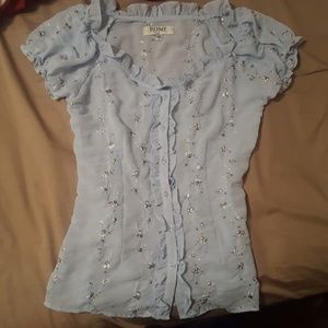Sheer blouse.