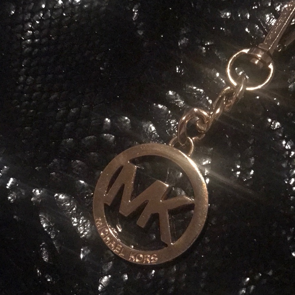 Michael Kors black crocodile purse.