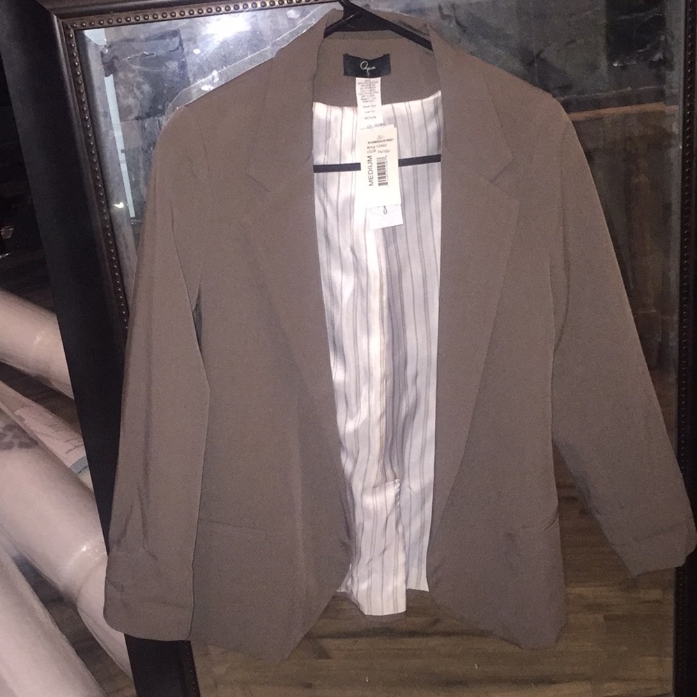 Women's blazer. Never worn. Still has tags