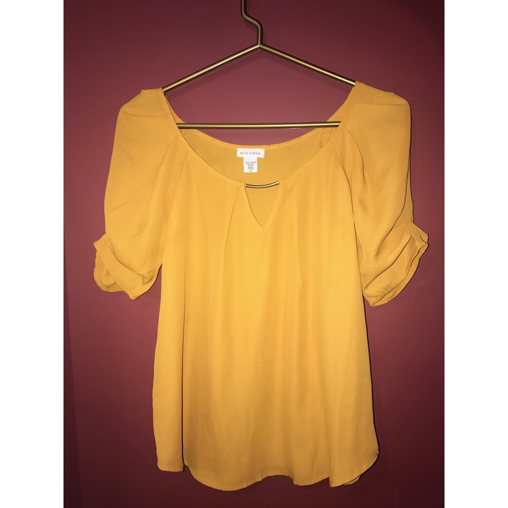 mustard colored blouse