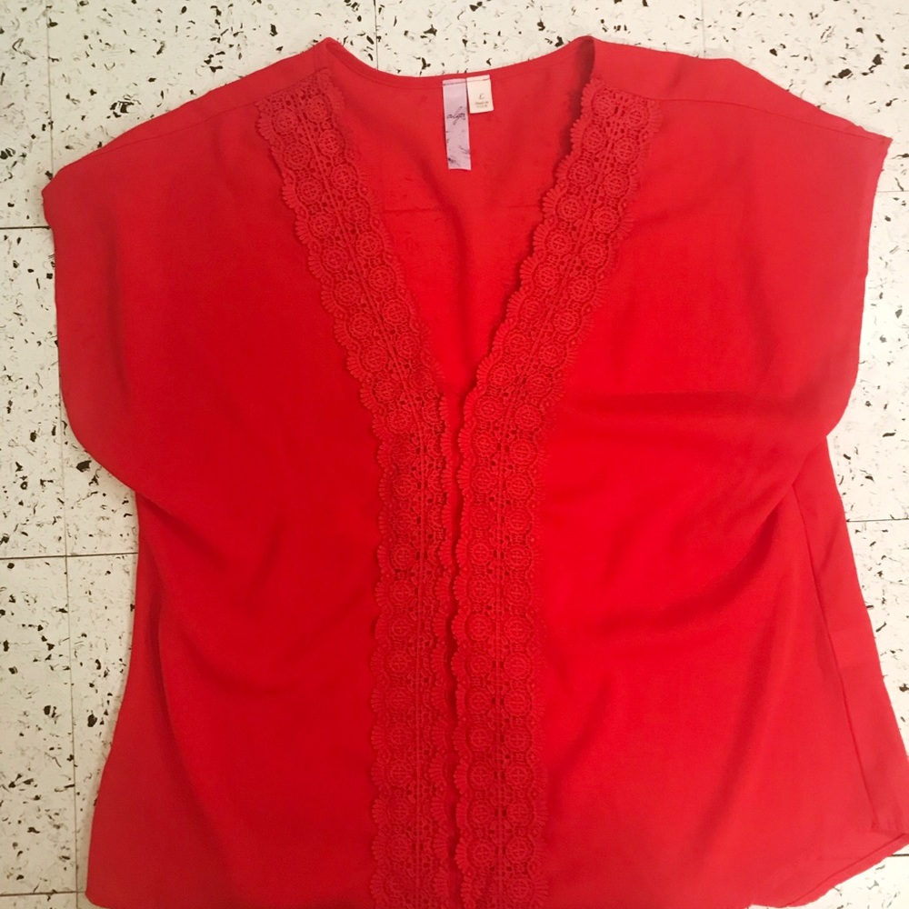 Red lace trimmed blouse