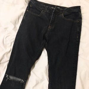 Distressed skinny dark blue grey denim jeans