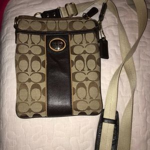 Monogrammed brown coach crossbody bag