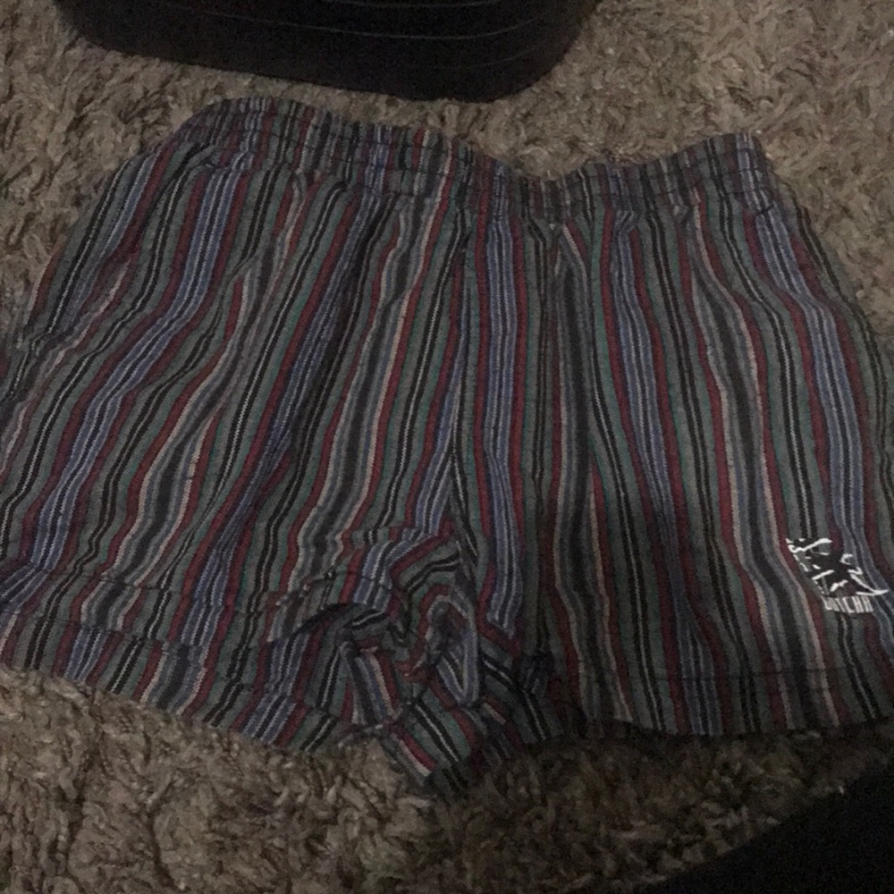 I am selling a pair of shorts with lines of color