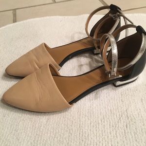 Pointed toe flat with silver ankle ties