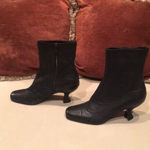 Never worn Prada booties.