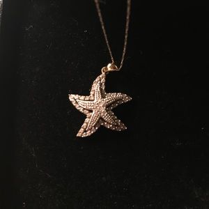 Gold starfish necklace