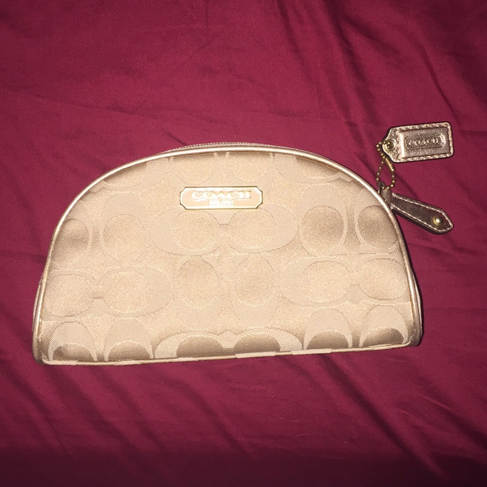 New gold coach cosmetic bag