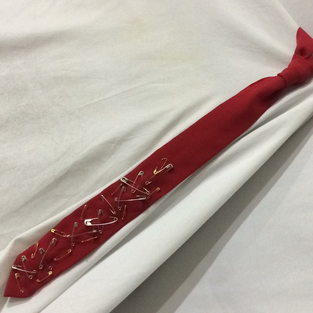 Red safety pin cluster tie