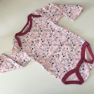 A Set of 3 Baby Girl Onesies