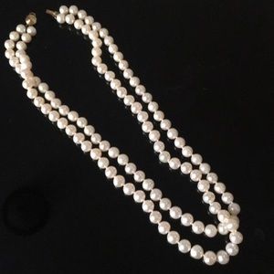 Double string of pearls with gold clasp