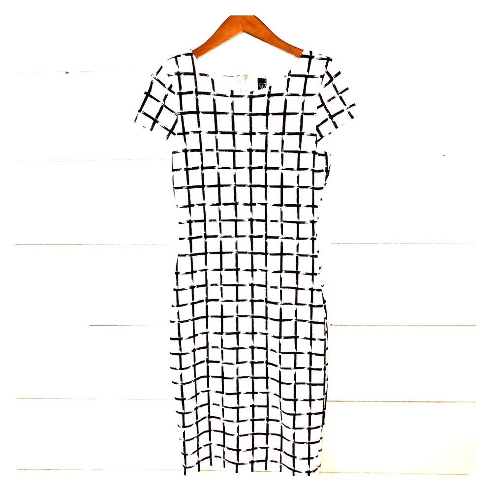 Women’s t-sleeve black and white Windsor dress.