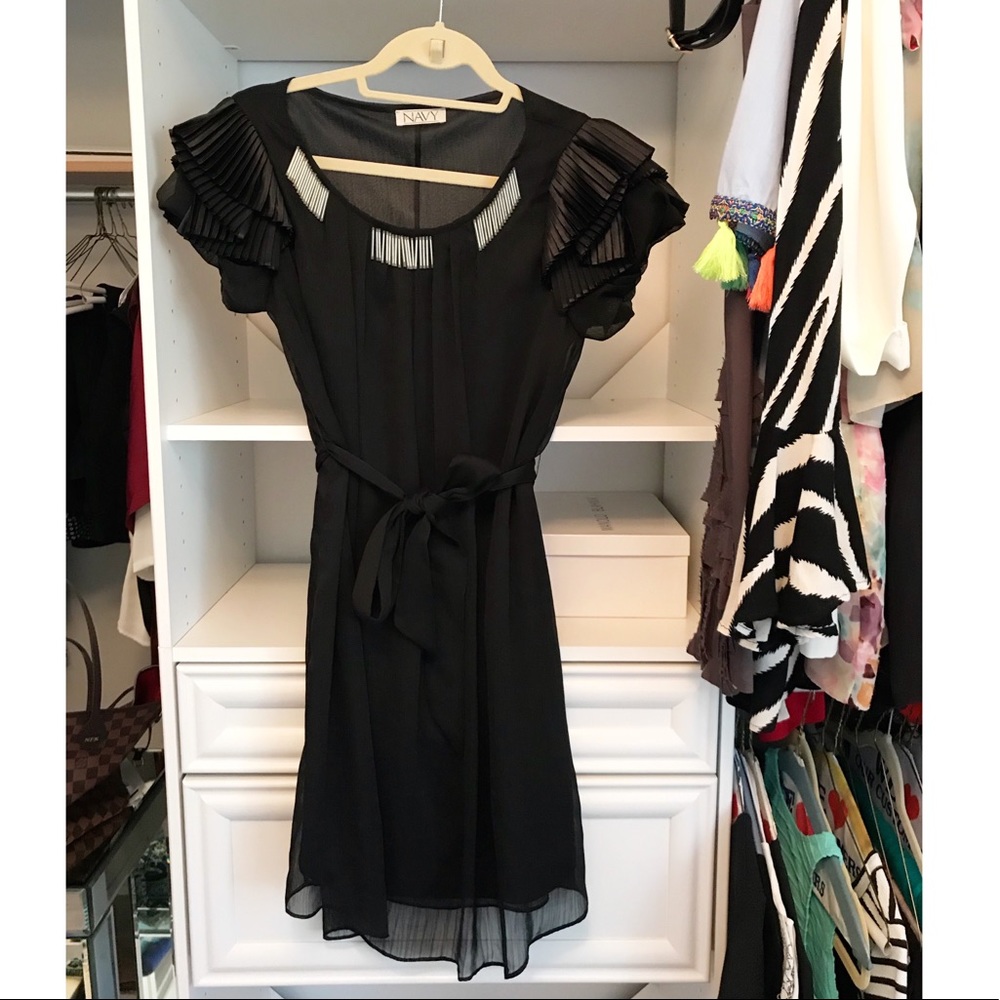 Black Tie waist ruffle sleeve dress with beading.