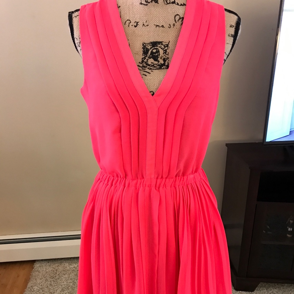Small, bright pink pleated Victoria Secret dress