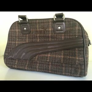 Brown on brown puma purse.