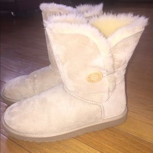 Sand colored Ugg boots with side buttons