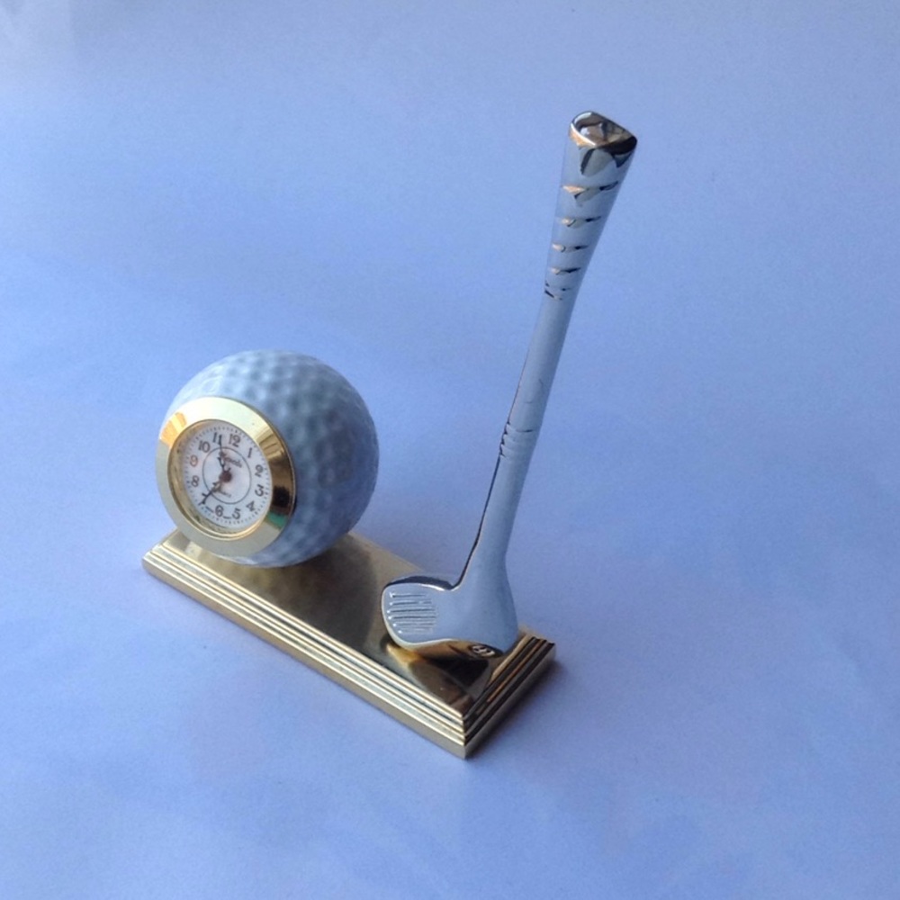 Mini golf ball and golf club.