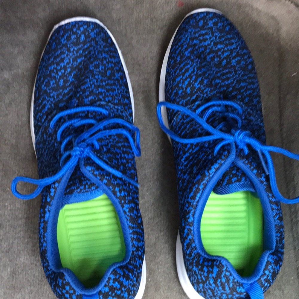 Men’s blue and black sneakers.