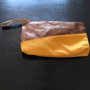 Bronze and gold makeup bag