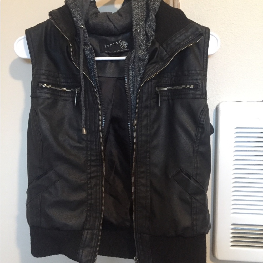 Sleeveless leathery looking black jacket with hood