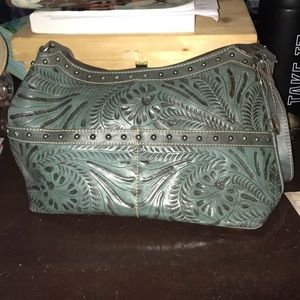 Tooled leather shoulder bag