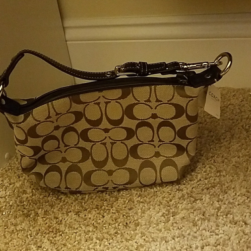 Coach purse! Never used! Tag on!