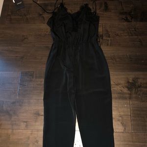 Long black romper size small