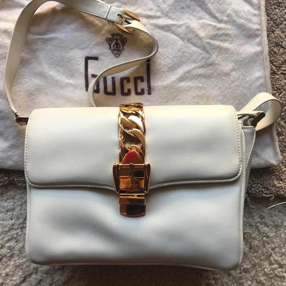 Gucci handbag, very elegant, leather, white &gold