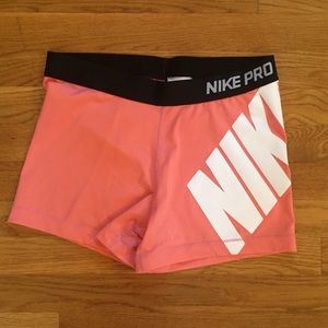 Pink Nike pro spandex shorts