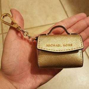 Michael Kors pale gold purse keychain