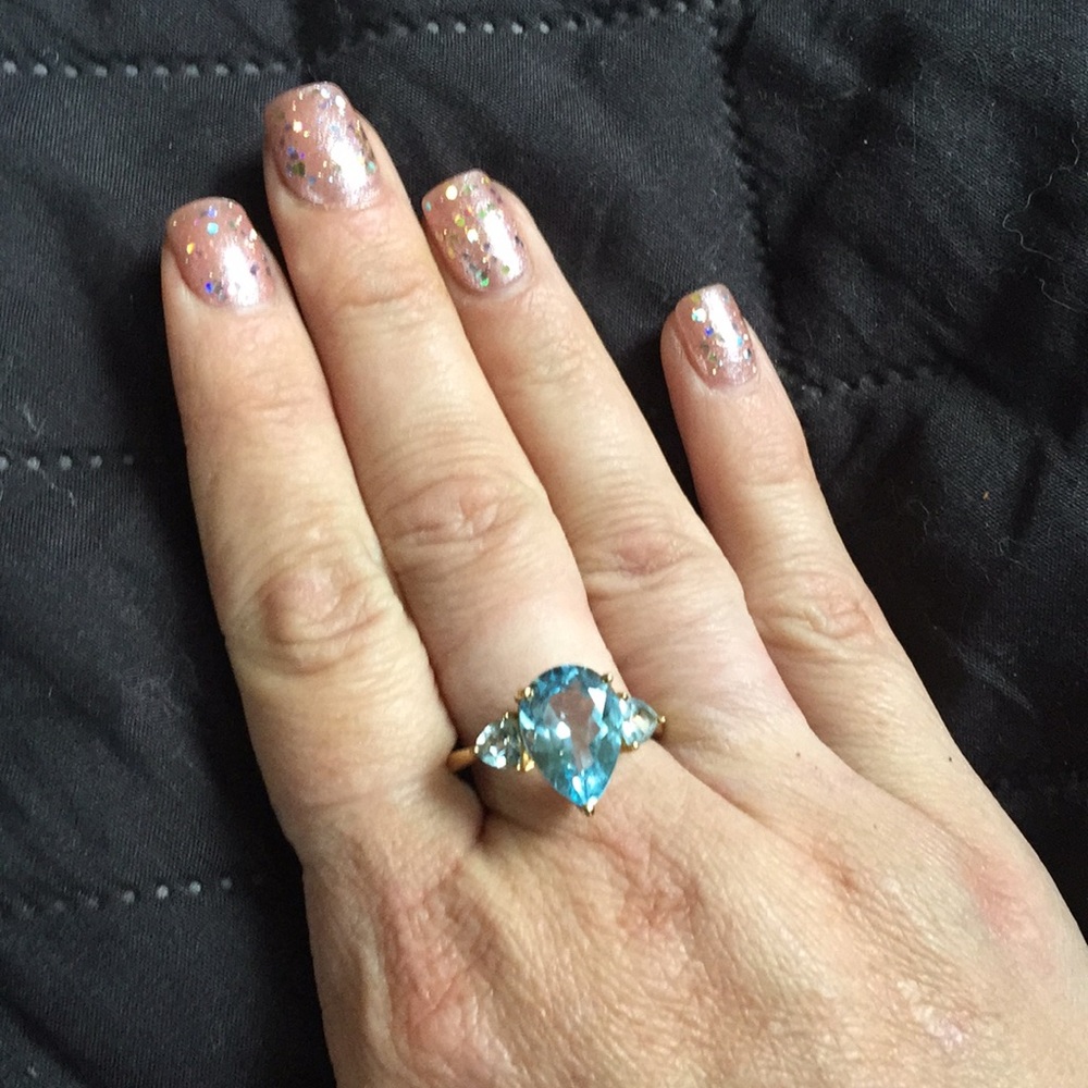 Silver Ring with Blue Topaz Plated In Gold