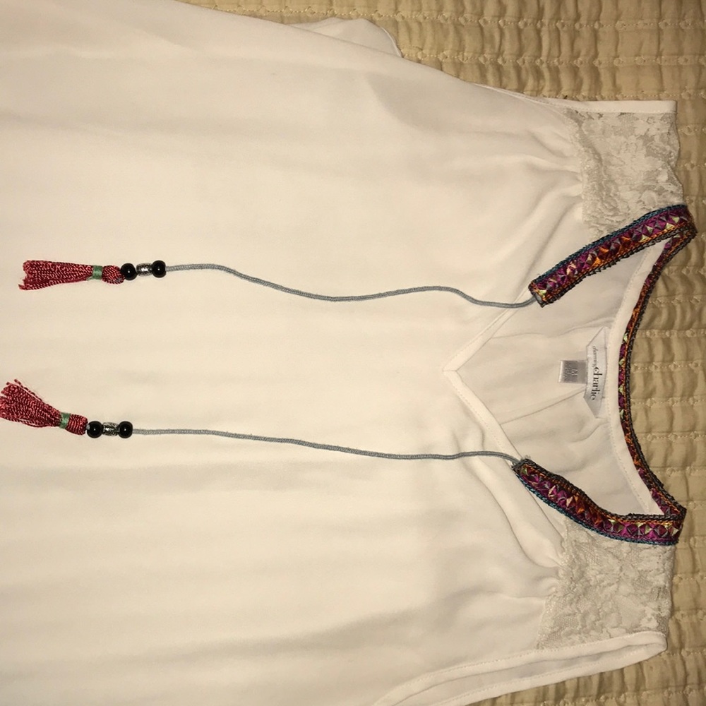 Semi-sheer white blouse from Charming Charlie.