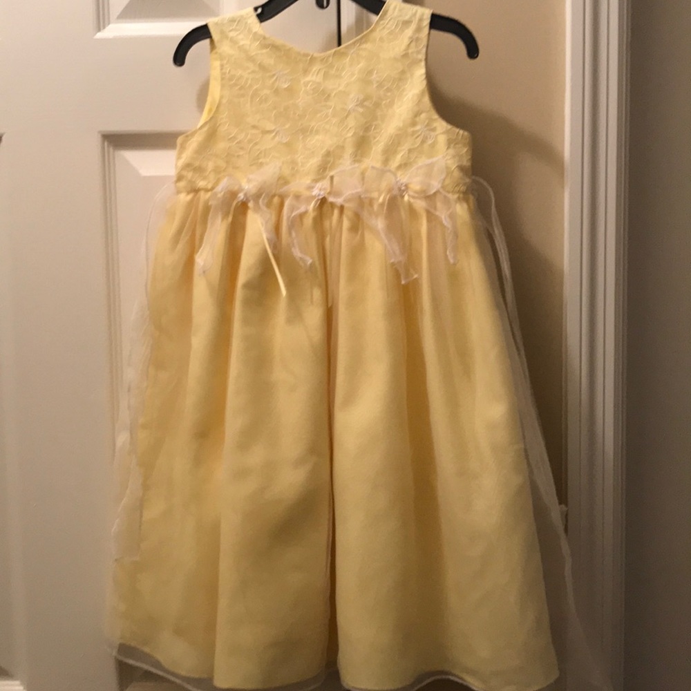 Yellow dress with white floral embroidery