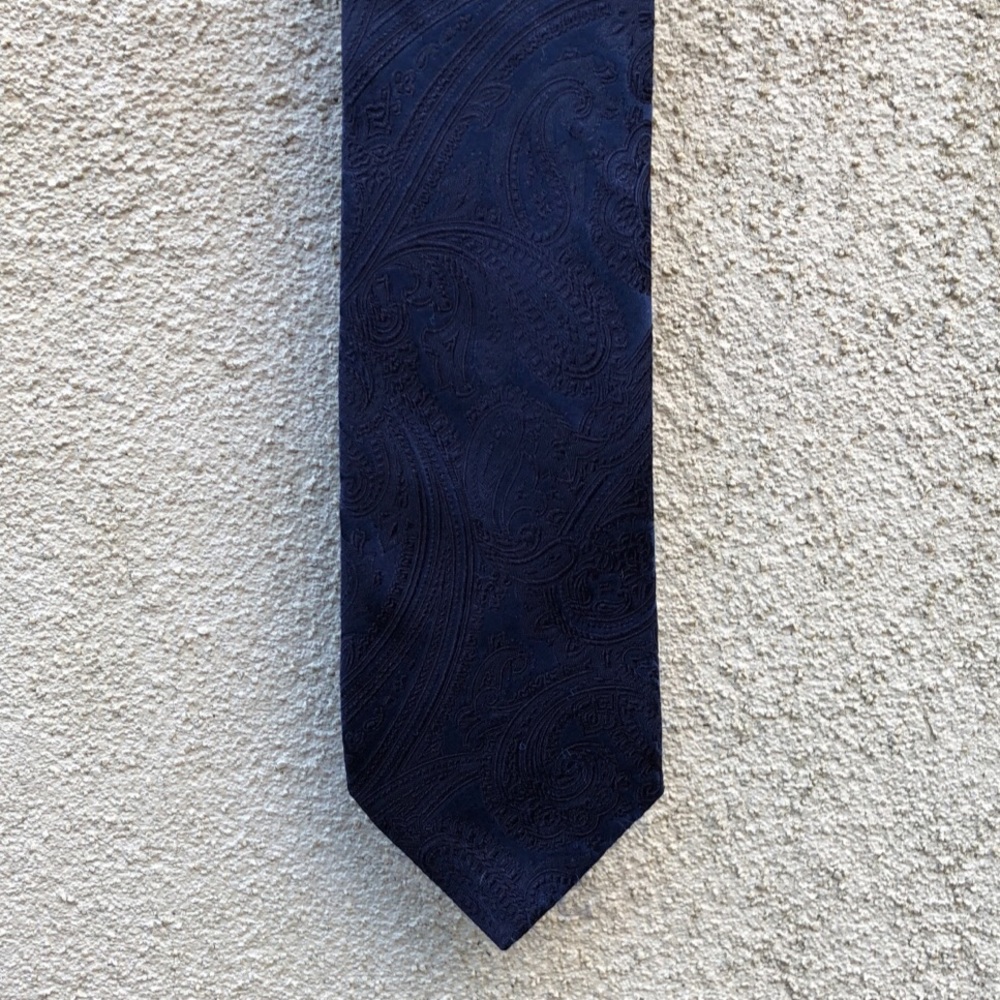 Silk navy blue-on-blue tie by Michael Kors.