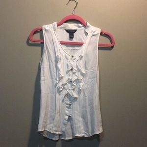 White buttoned down sleeveless blouse