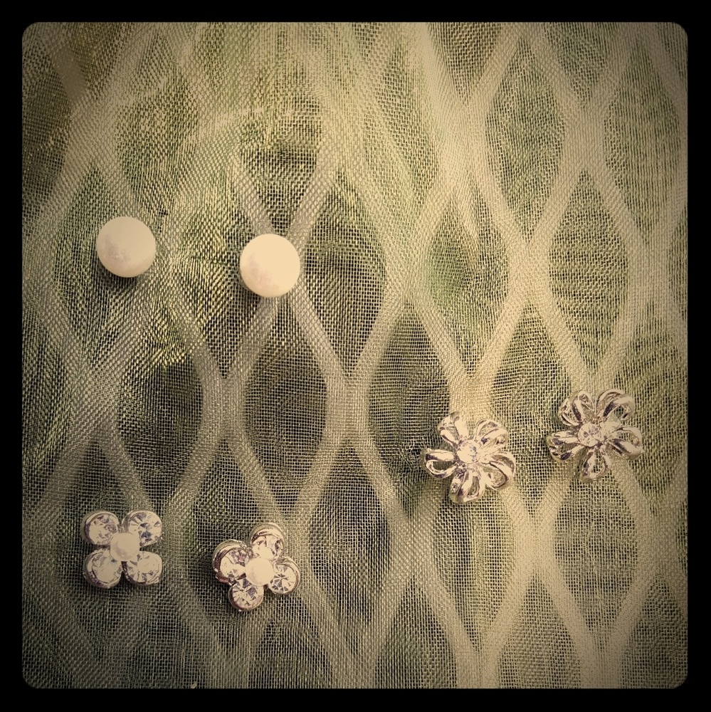 Trio of faux pearl and rhinestone earrings.