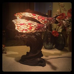 Stainglass fish backlit on bronze