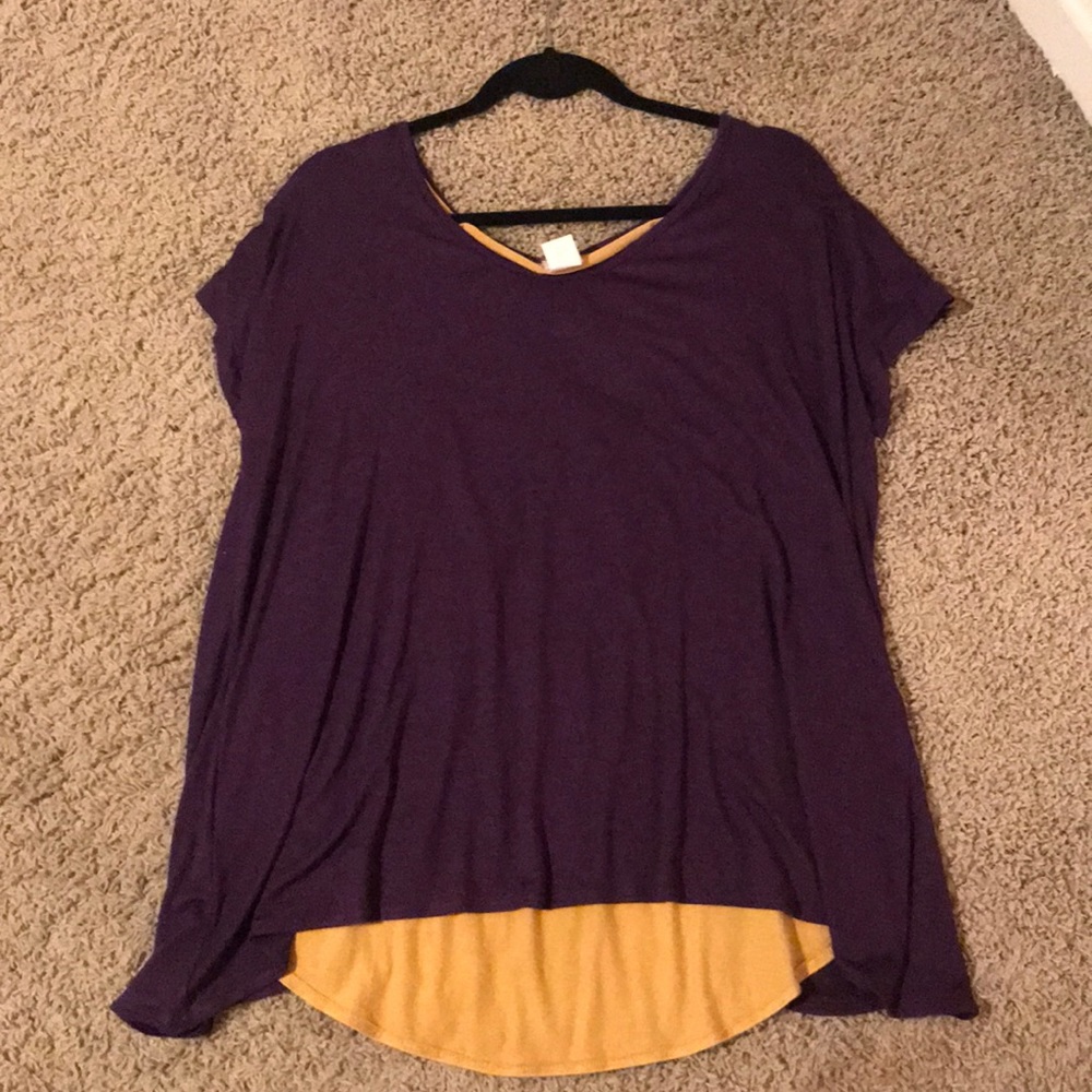 Purple shirt with yellow cut out in the back