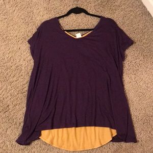 Purple shirt with yellow cut out in the back