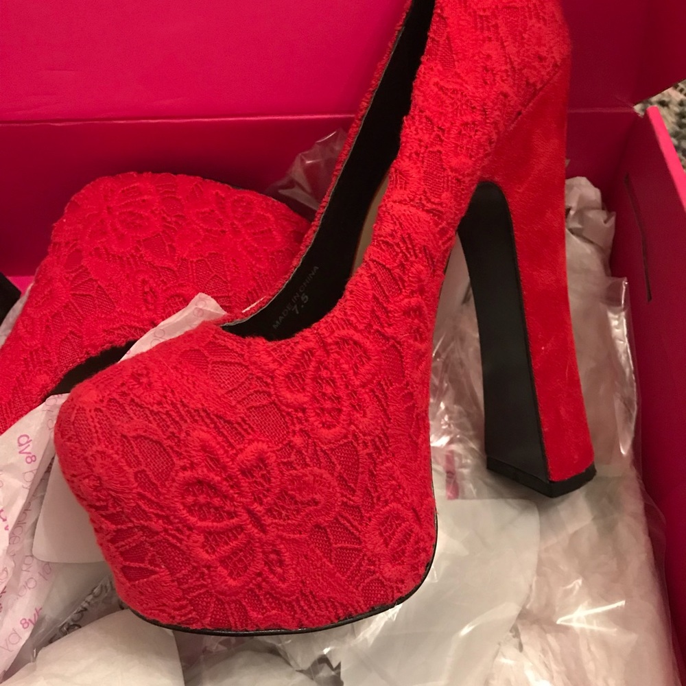 Tall red brocade heels