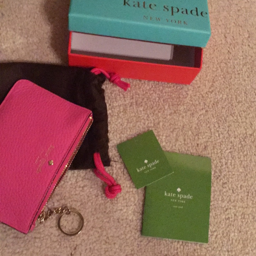 New! box&tags- Kate spade large leather wristlet.