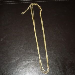 Gold colored layered necklace