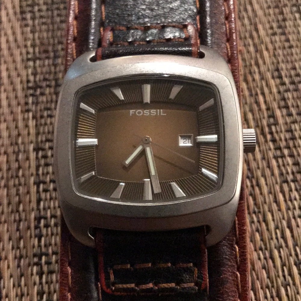 Fossil watch with a leather cuff band