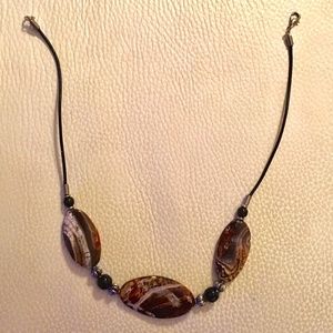 Necklace: three stones with black/red abstract