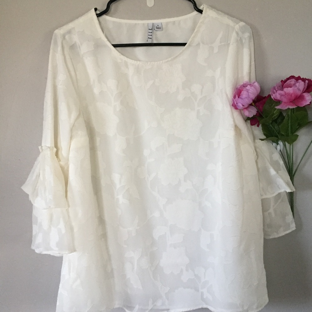 White ruffled sleeve top