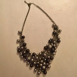Statement necklace decked with silver design