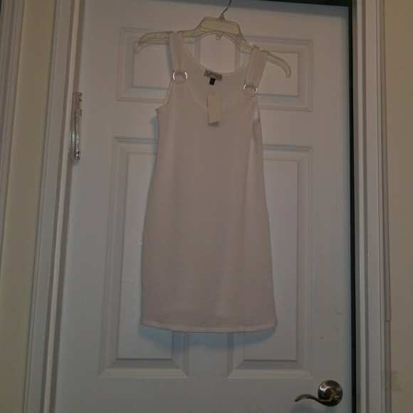 White swimsuit cover up.