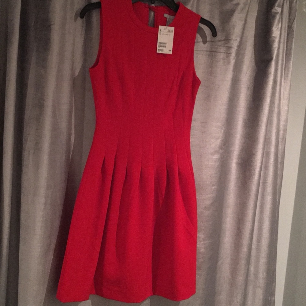 Red pleated dress