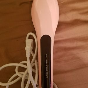 Heated hair straightening brush