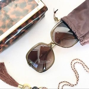 Tory Burch large frame sunglasses.
